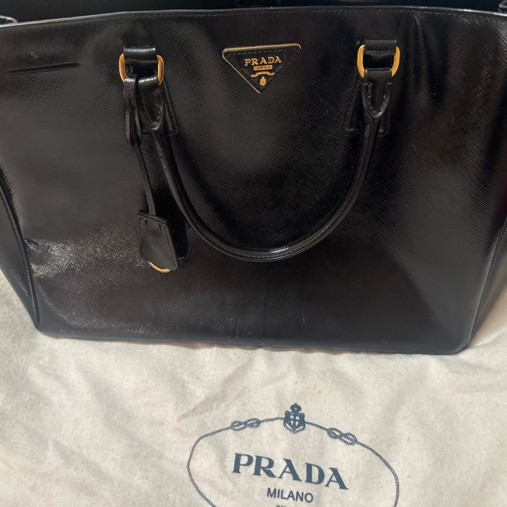 Prada Black Leather Handbag with Gold Accents